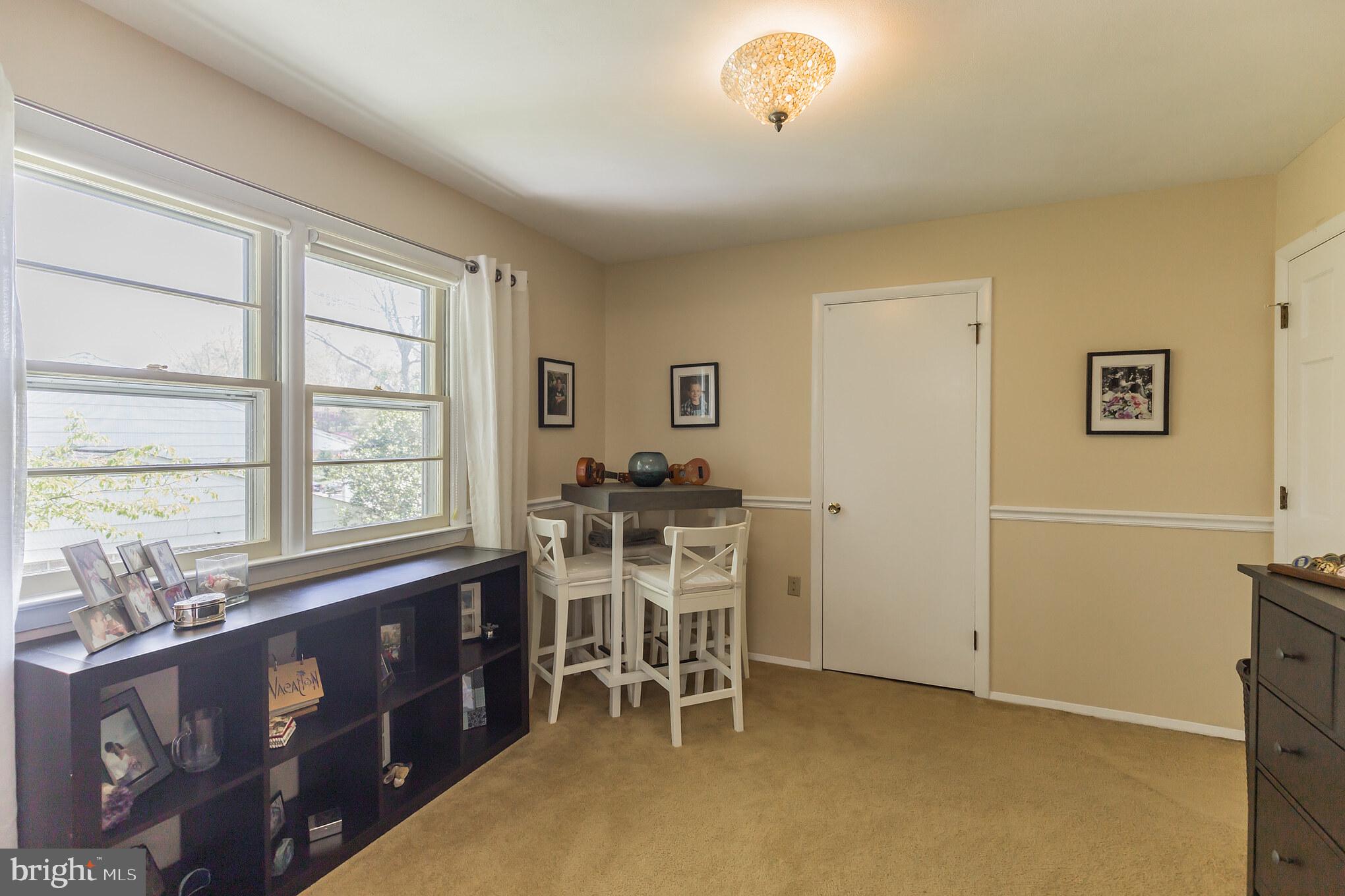7020 Hadlow Drive Springfield, VA 22152 - Photo 20 of 29 a dining room with furniture and a window