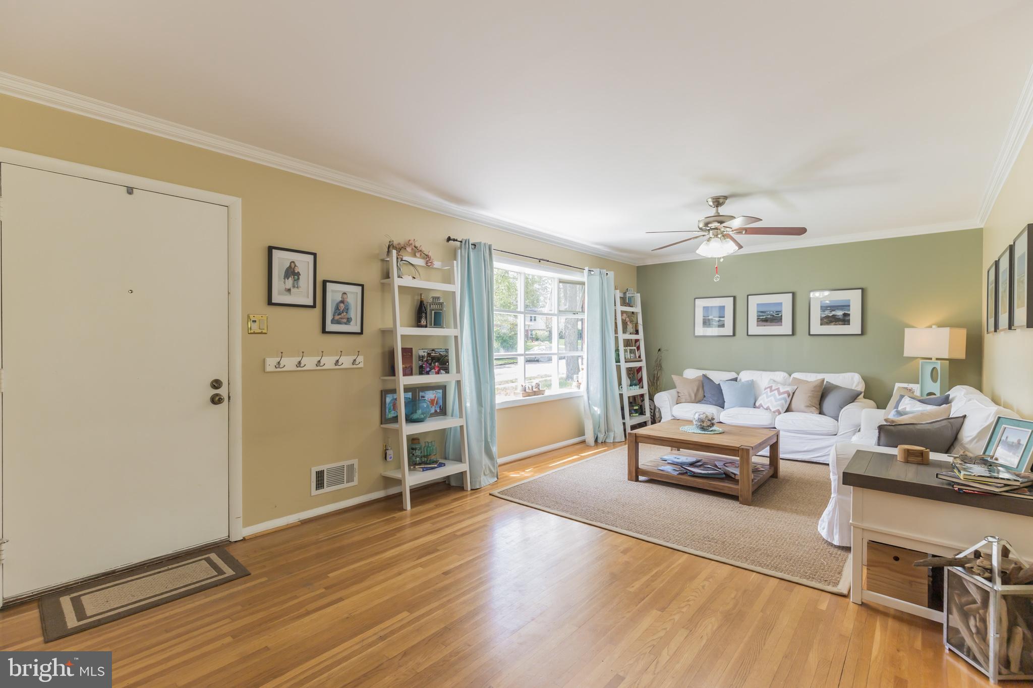 7020 Hadlow Drive Springfield, VA 22152 - Photo 6 of 29 a living room with furniture and wooden floor
