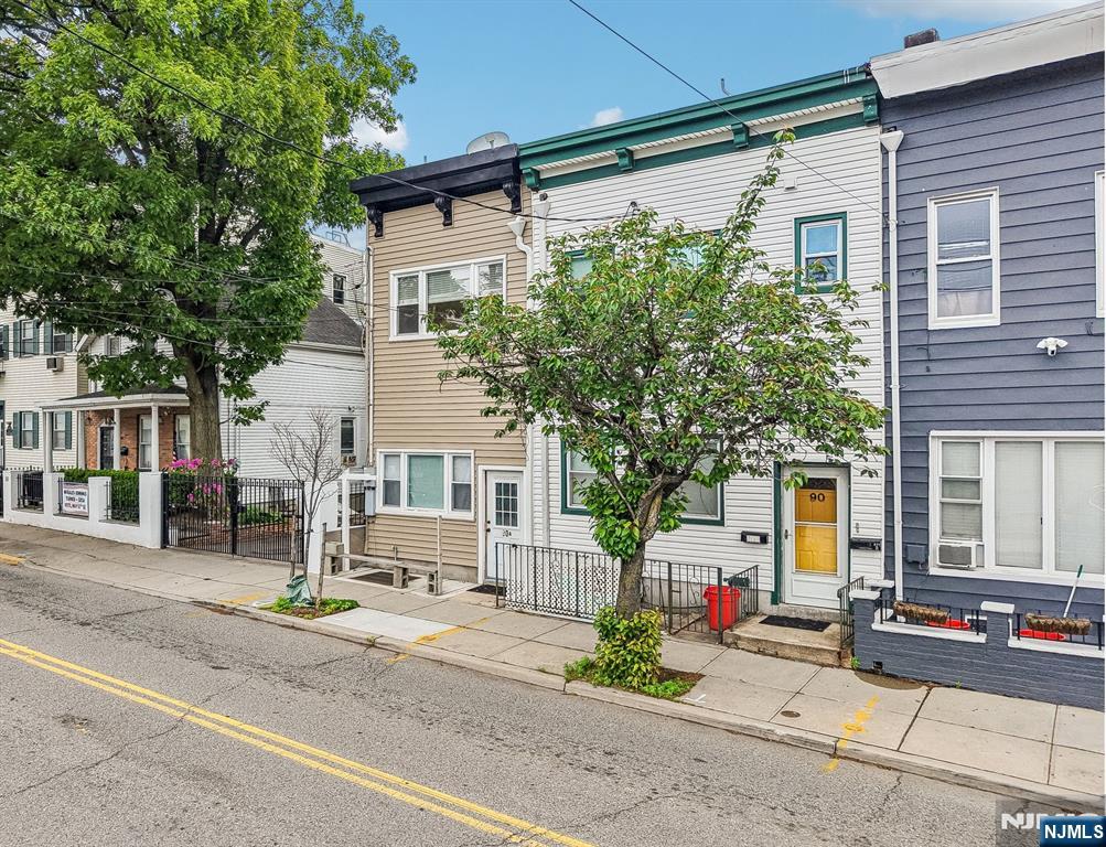 90 A Hackensack Plank Road Weehawken, NJ 07086 - Photo 3 of 40 a front view of a house with garden