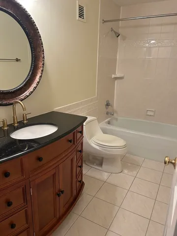 $815,000 | 1 Oak Brook Club Drive, Unit A105, Oak Brook, IL 60523