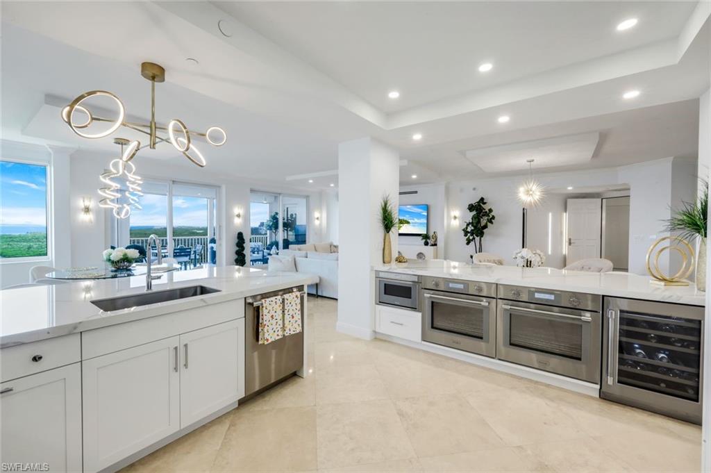 275 Indies Way, Unit 1503 Naples, FL 34110 - Photo 13 of 49 Kitchen with High End Appliances