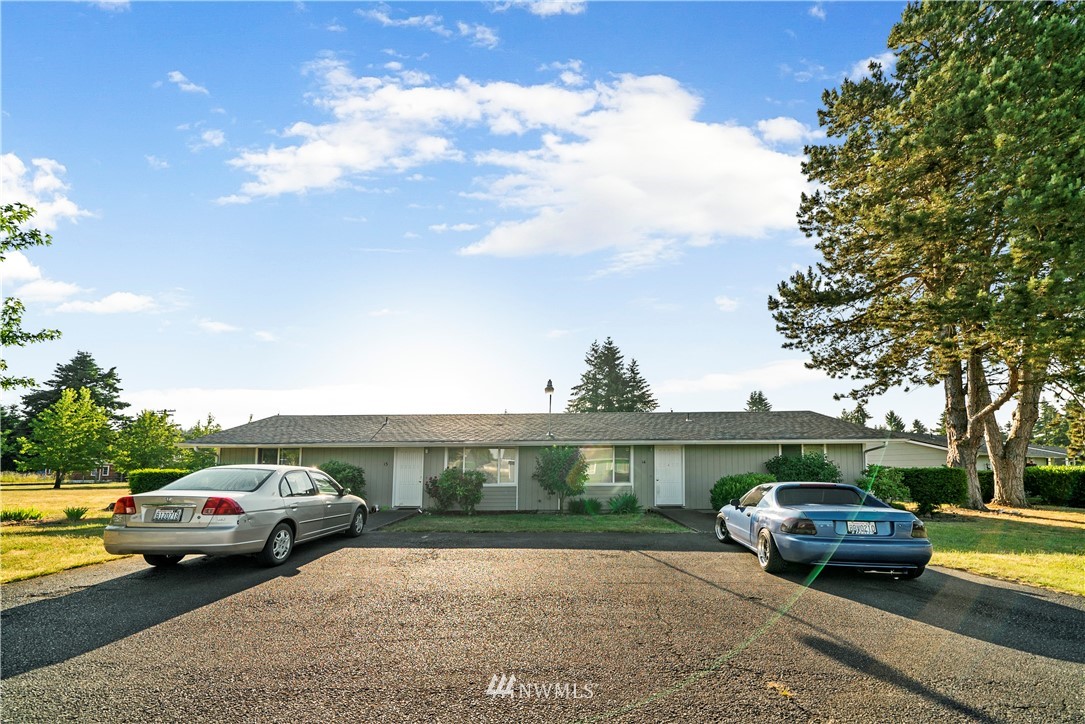 6601 198th Way Southwest Rochester, WA 98579 - Photo 7 of 10 a view of street with parked cars
