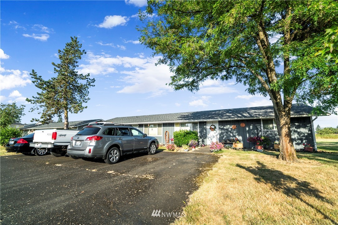 6601 198th Way Southwest Rochester, WA 98579 - Photo 10 of 10 a view of street with parked cars