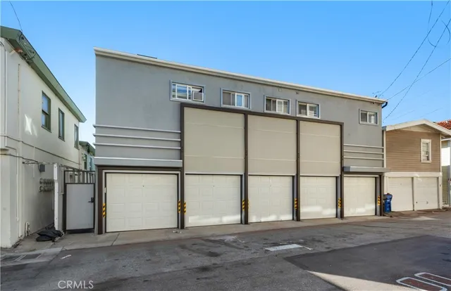 a front view of a building with a street
