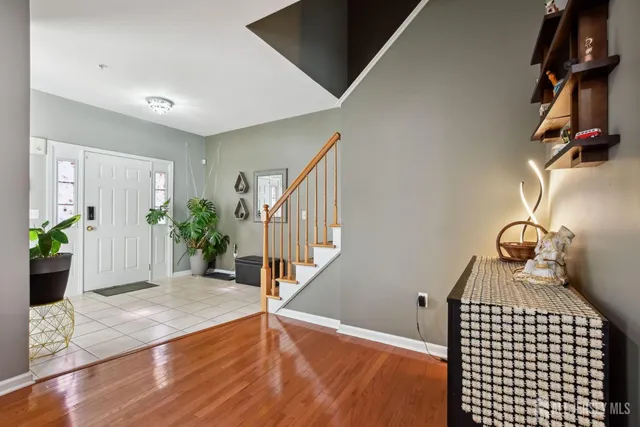 a view of entryway with wooden floor
