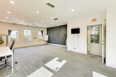 a view of livingroom with furniture and wooden floor