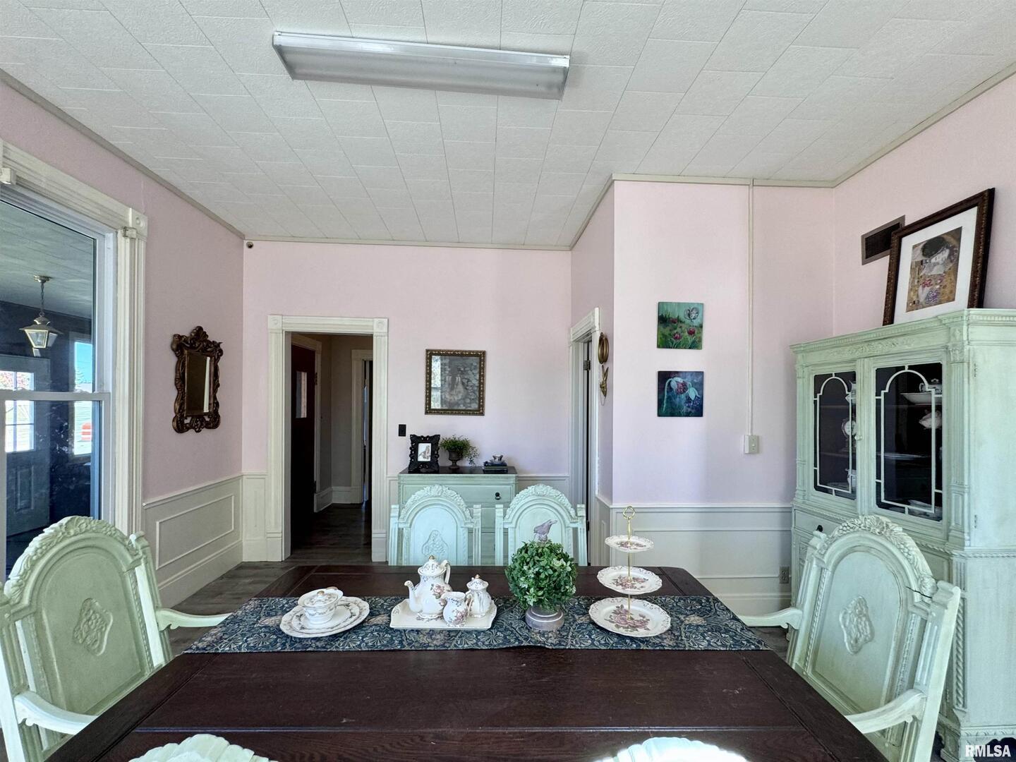 1415 4th Street Fulton, IL 61252 - Photo 11 of 58 a view of a dining room with furniture window and wooden floor