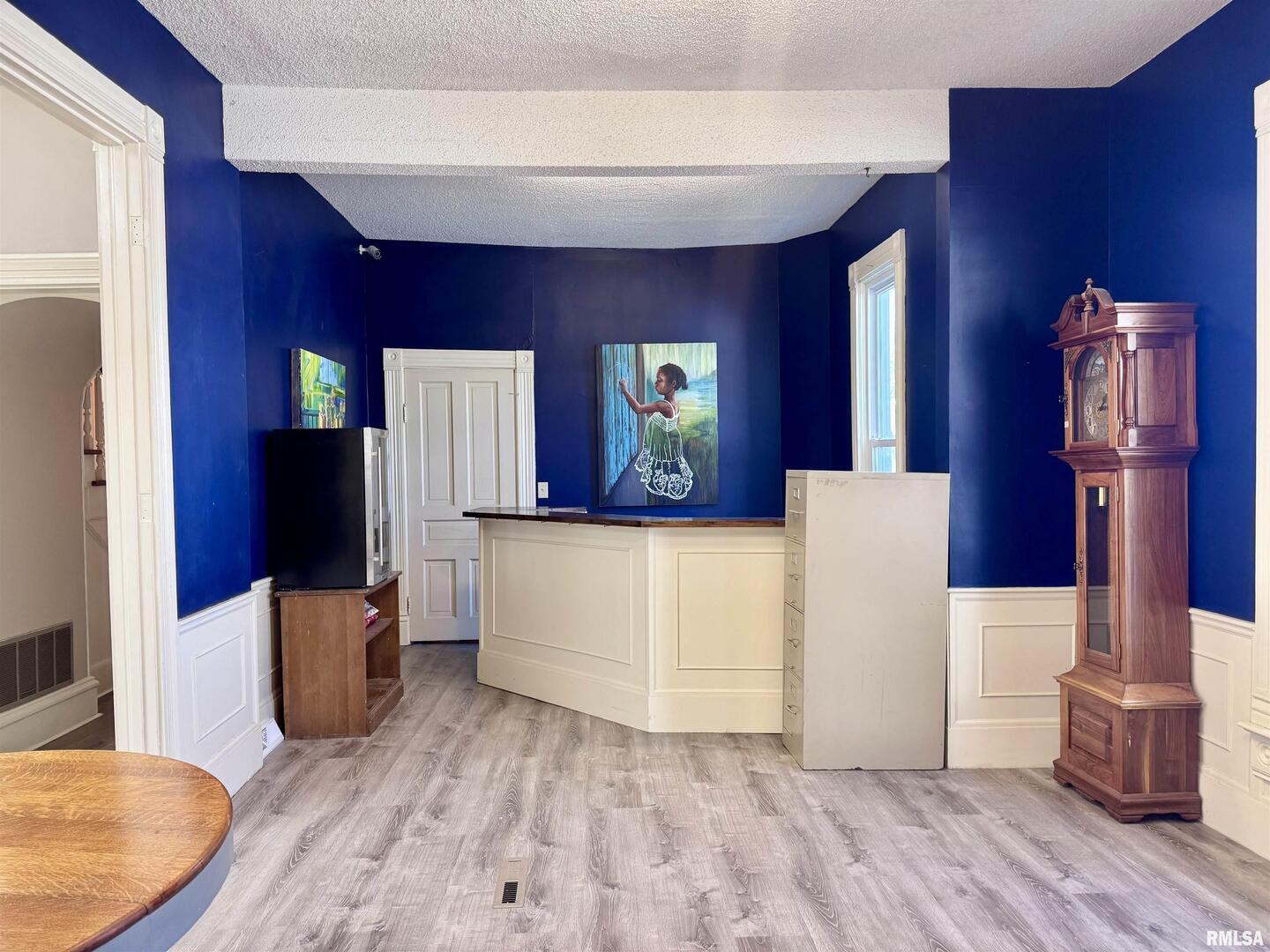 1415 4th Street Fulton, IL 61252 - Photo 17 of 58 a view of a living room with furniture and wooden floor