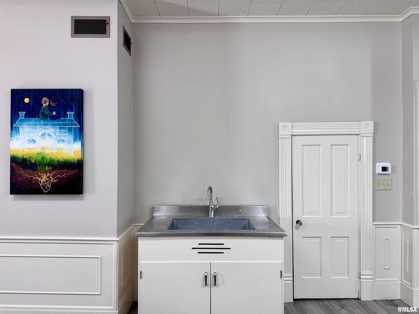 1415 4th Street Fulton, IL 61252 - Photo 26 of 58 a bathroom with a sink and a mirror
