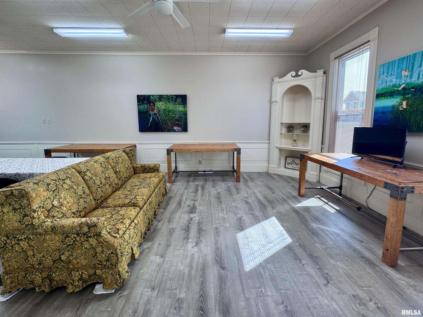 1415 4th Street Fulton, IL 61252 - Photo 28 of 58 a living room with furniture and a wooden floor
