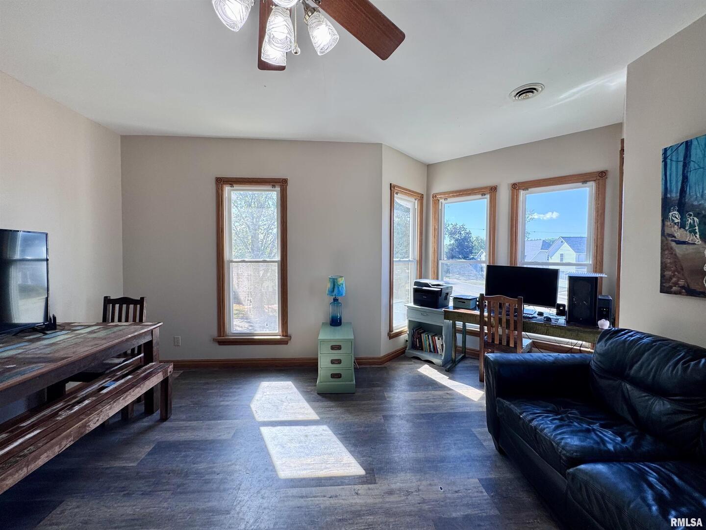 1415 4th Street Fulton, IL 61252 - Photo 39 of 58 a living room with furniture and a fireplace