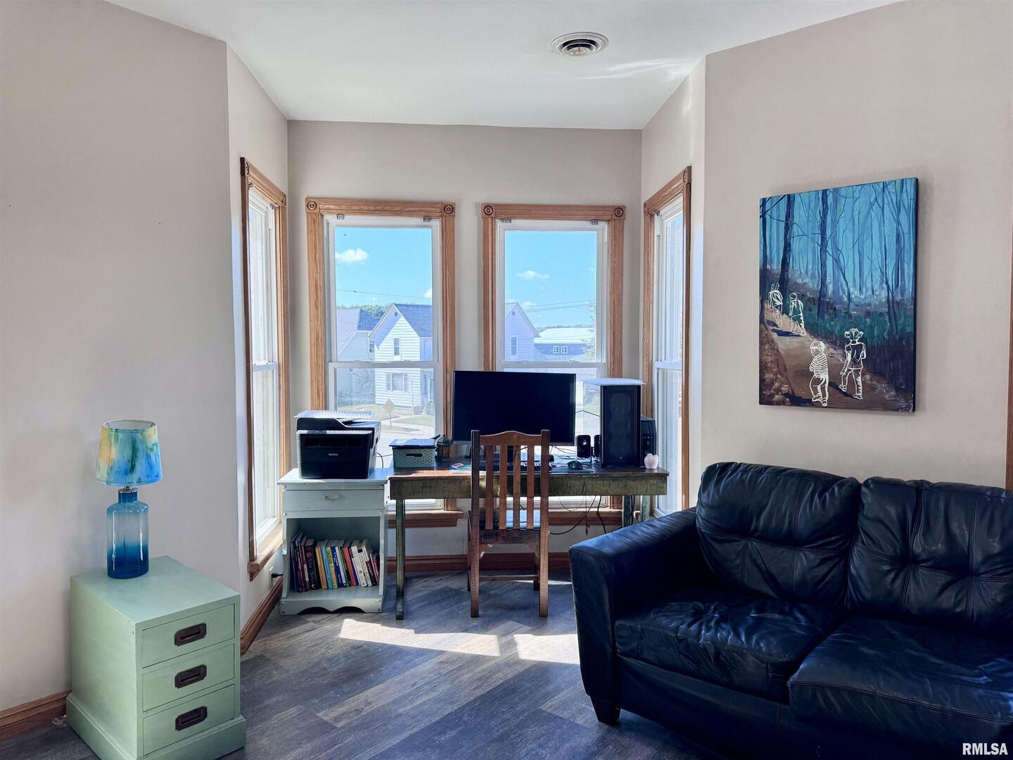 1415 4th Street Fulton, IL 61252 - Photo 41 of 58 a living room with furniture and a fireplace