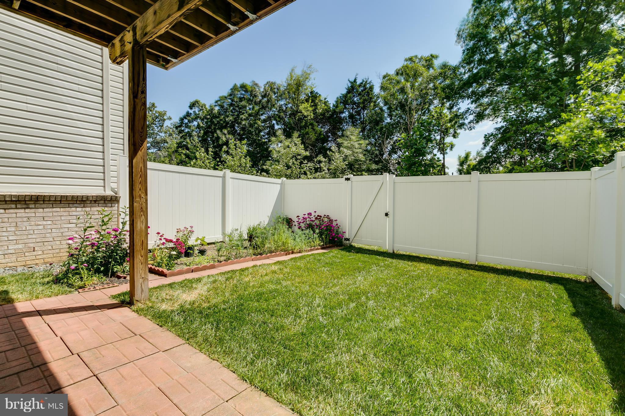 22688 Flowing Spring Square Ashburn, VA 20148 - Photo 29 of 30 Exterior (Rear)