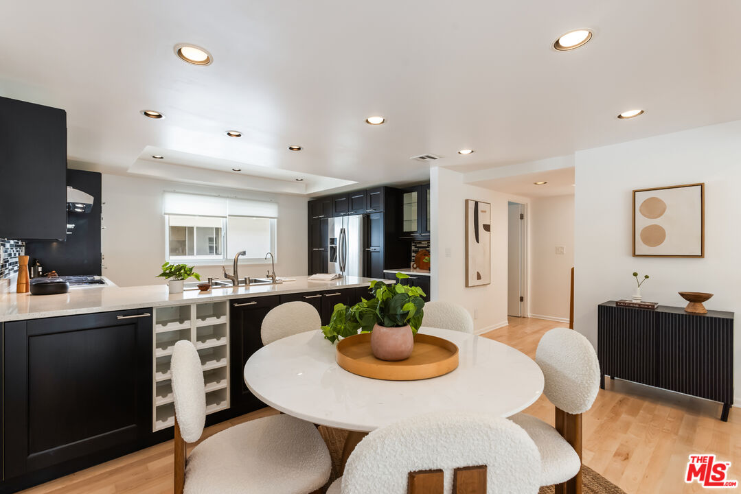 13230 Fiji Way, Unit B Marina del Rey, CA 90292 - Photo 12 of 65 a view of a dining room with furniture