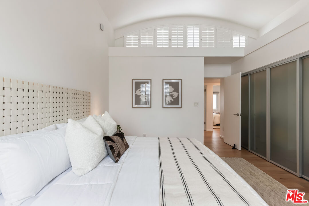 13230 Fiji Way, Unit B Marina del Rey, CA 90292 - Photo 28 of 65 a en suite bathroom with a sink and a mirror