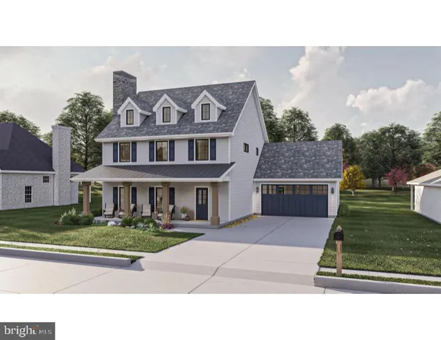 a view of green field with trees