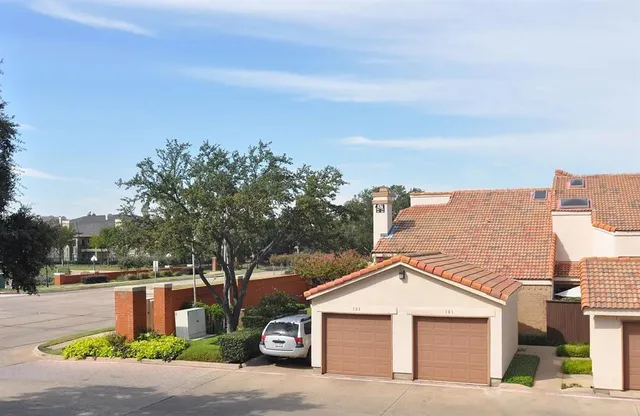 a view of a house with a street