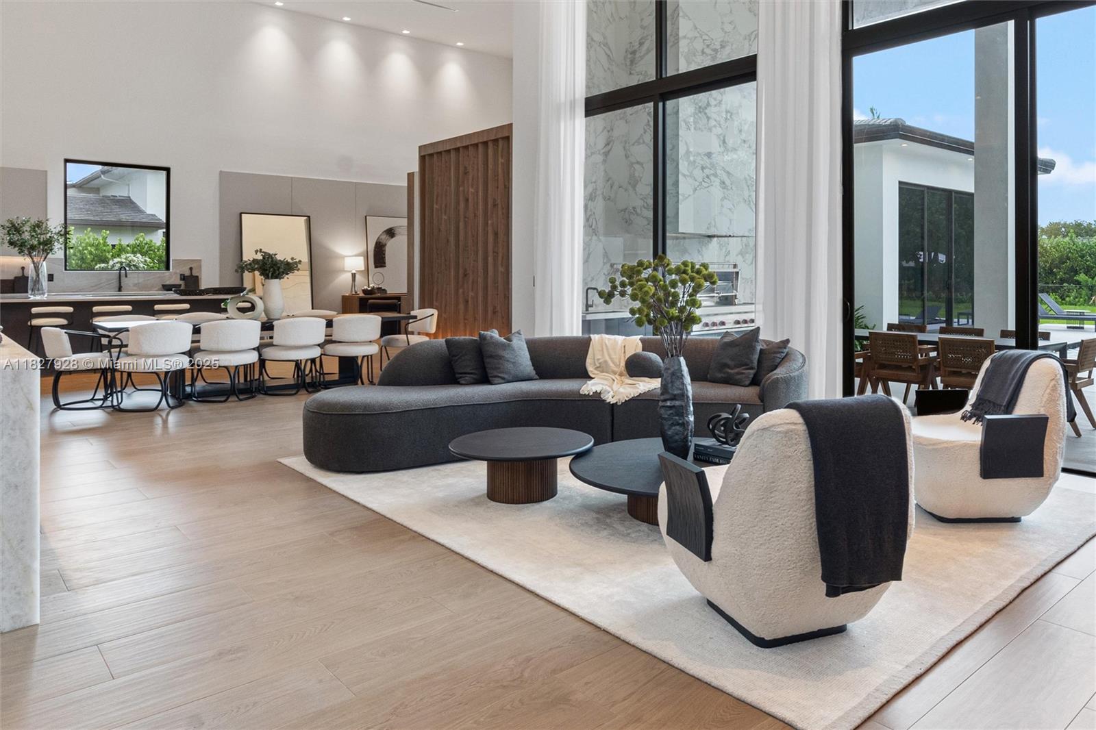 1520 Southwest 149th Terrace Fort Lauderdale, FL 33325 - Photo 11 of 80 a living room with fireplace furniture and a large window