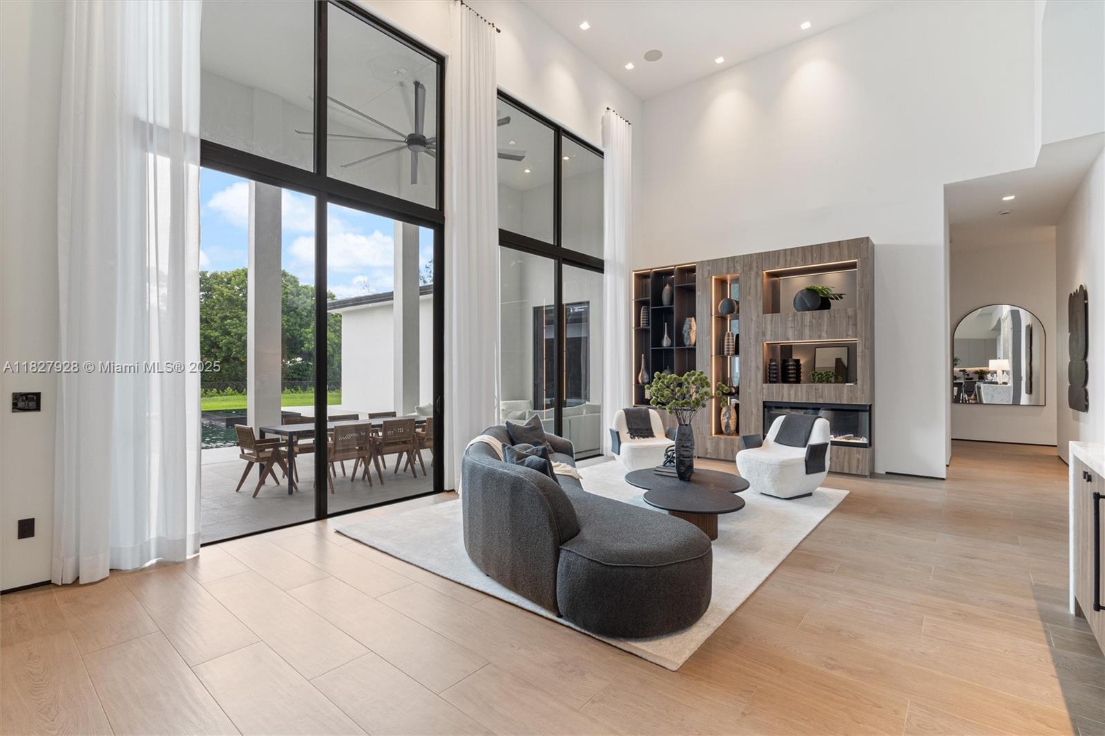 1520 Southwest 149th Terrace Fort Lauderdale, FL 33325 - Photo 12 of 80 a living room with furniture and large windows