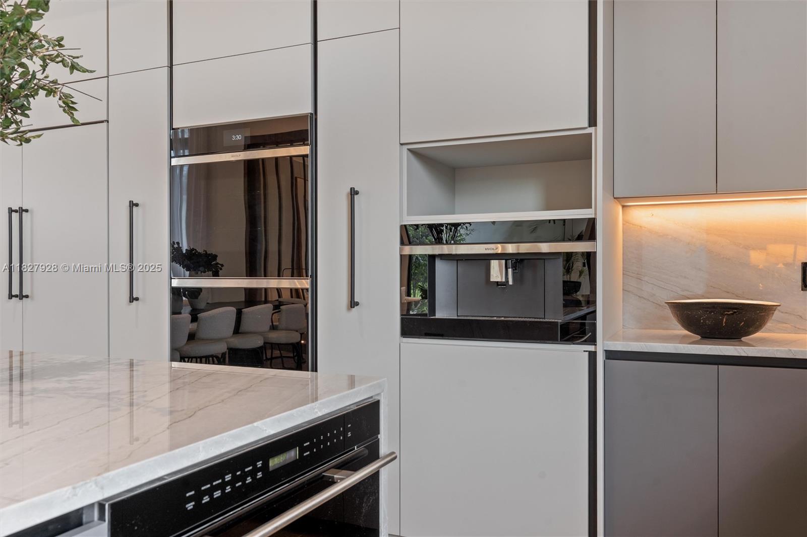 1520 Southwest 149th Terrace Fort Lauderdale, FL 33325 - Photo 20 of 80 a kitchen with stainless steel appliances a refrigerator and a sink