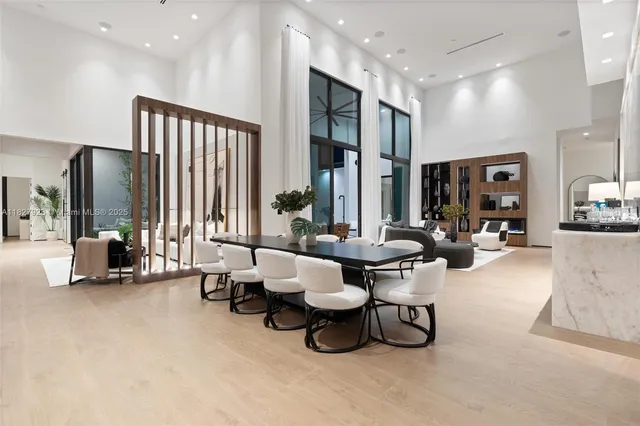 a kitchen with kitchen island a counter top space and cabinets