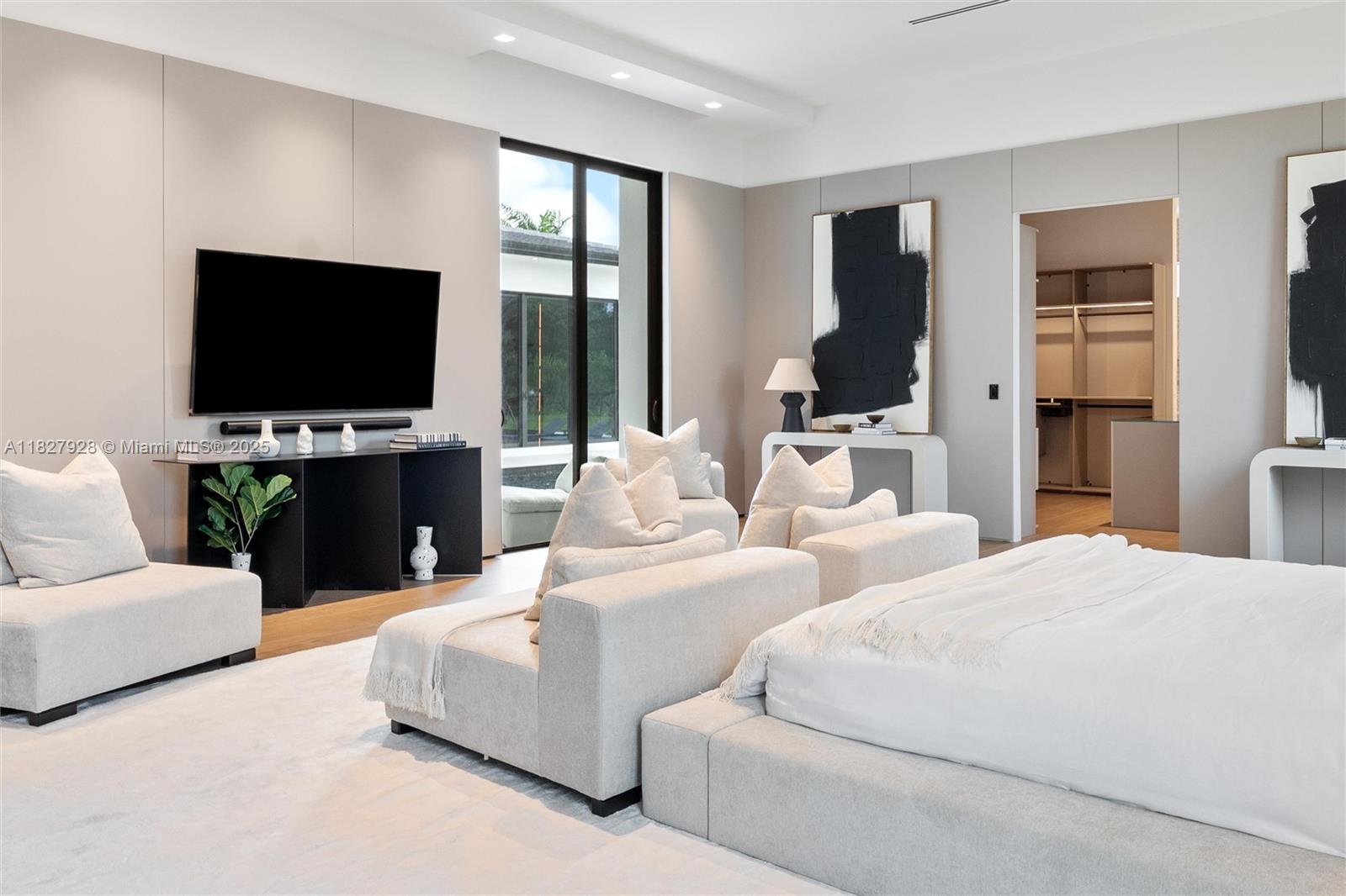 1520 Southwest 149th Terrace Fort Lauderdale, FL 33325 - Photo 34 of 80 a living room with furniture and a flat screen tv