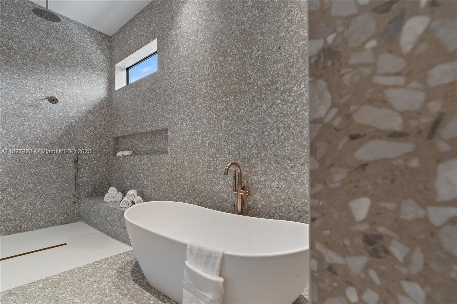 1520 Southwest 149th Terrace Fort Lauderdale, FL 33325 - Photo 39 of 80 a white bath tub sitting in a bathroom