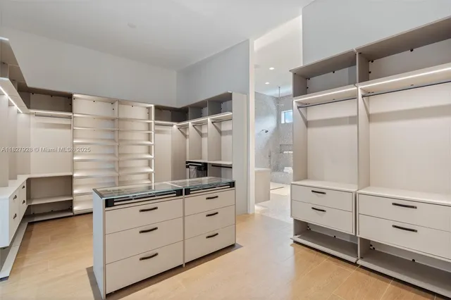 a utility room with sink dryer and washer