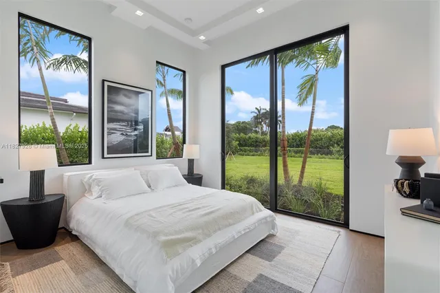 a view of a patio with couches and pool