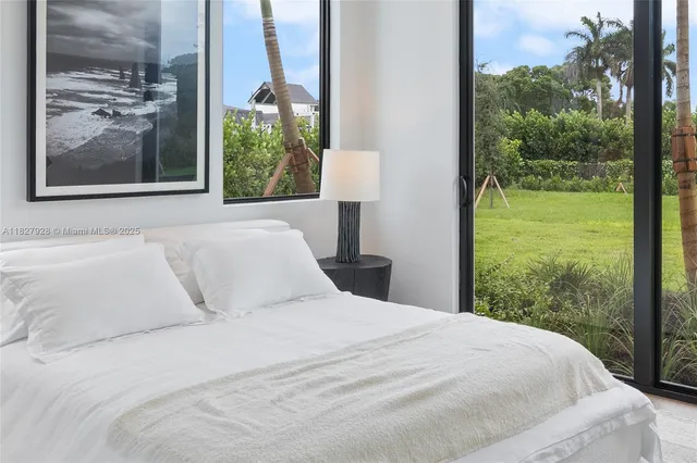 a view of a patio with swimming pool table and chairs