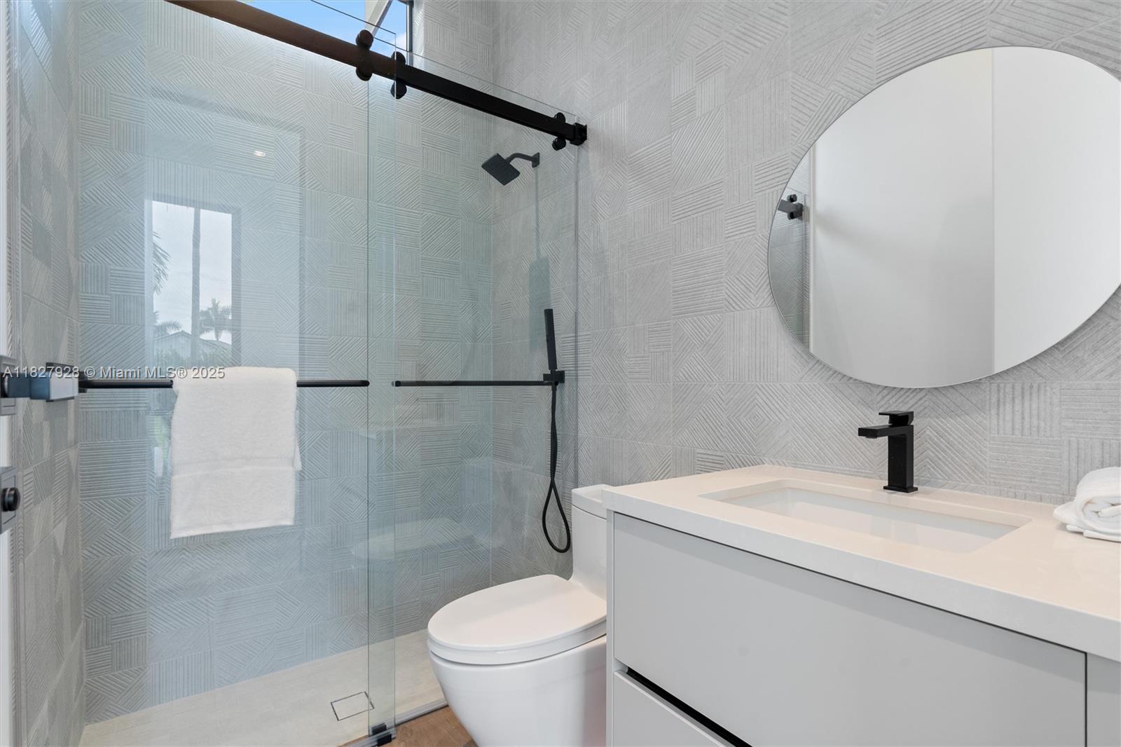 1520 Southwest 149th Terrace Fort Lauderdale, FL 33325 - Photo 47 of 80 a bathroom with a sink toilet and shower