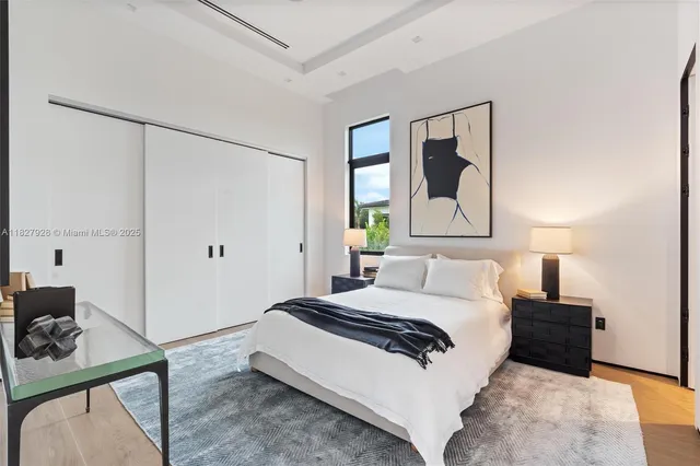 an aerial view of a house with a yard lake view and mountain view