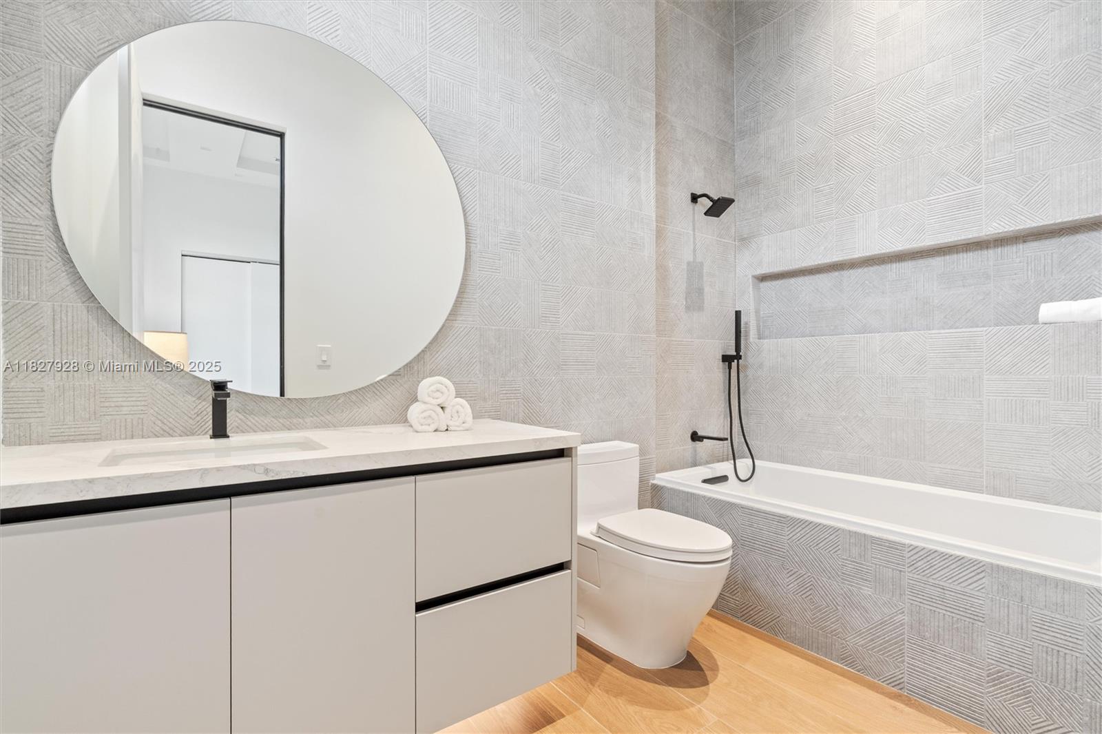 1520 Southwest 149th Terrace Fort Lauderdale, FL 33325 - Photo 50 of 80 a bathroom with a sink a toilet and a mirror