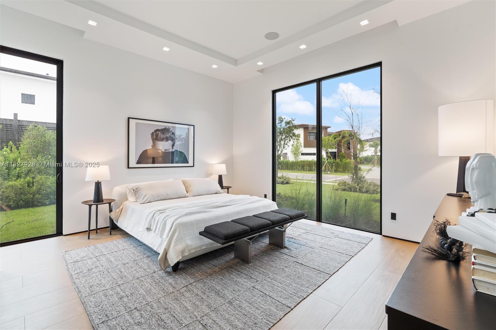 1520 Southwest 149th Terrace Fort Lauderdale, FL 33325 - Photo 52 of 80 a bedroom with a bed and a large window