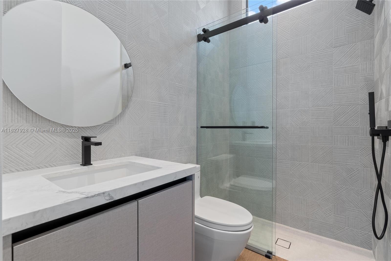 1520 Southwest 149th Terrace Fort Lauderdale, FL 33325 - Photo 62 of 80 a bathroom with a sink a toilet and shower