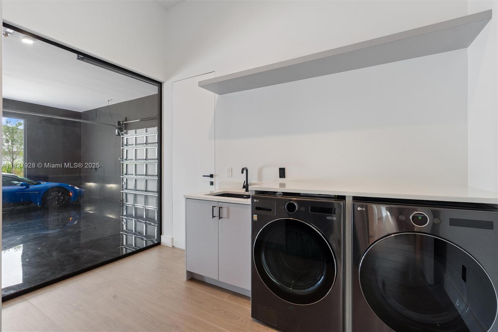 1520 Southwest 149th Terrace Fort Lauderdale, FL 33325 - Photo 66 of 80 a utility room with sink dryer and washer