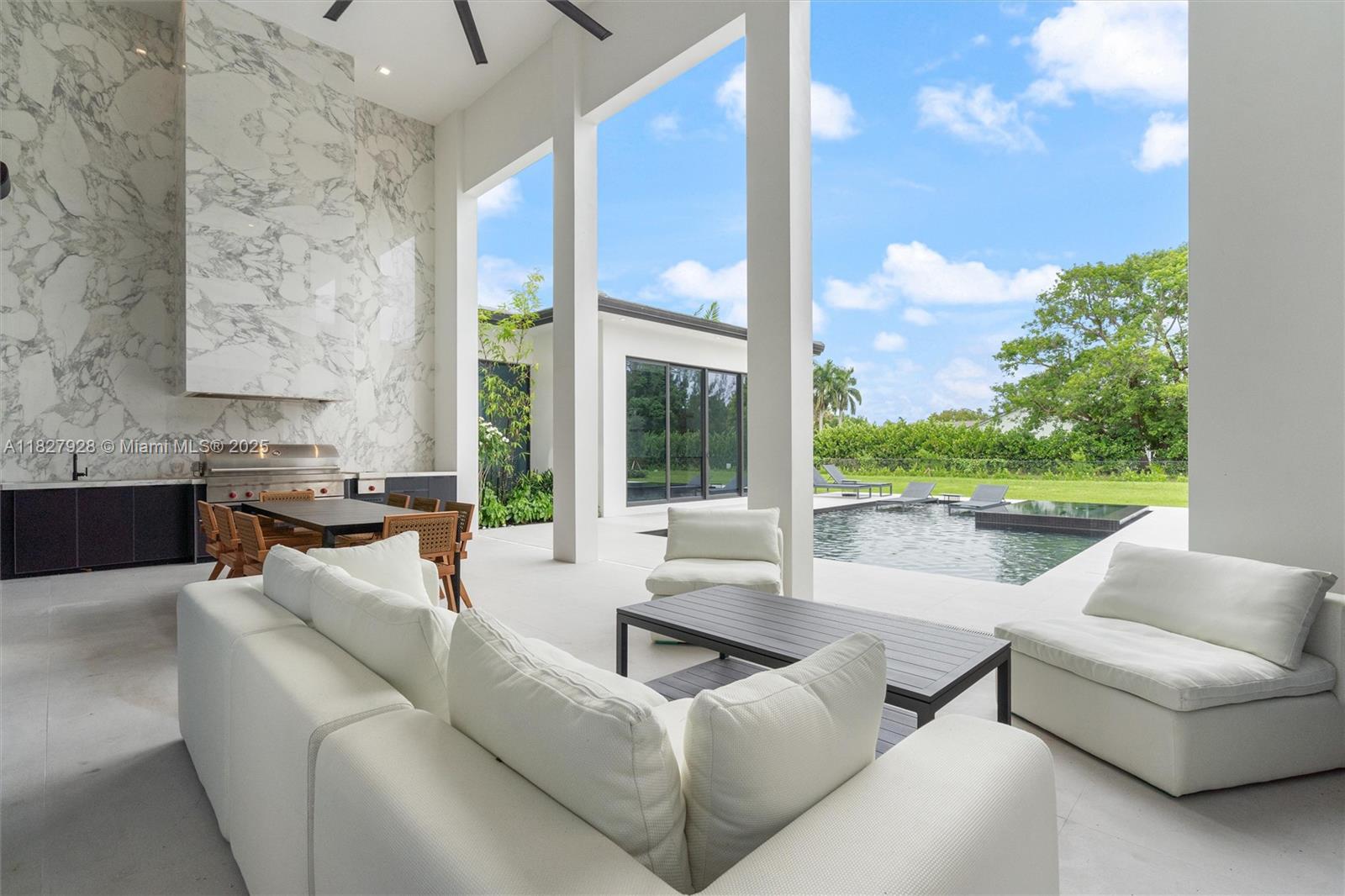 1520 Southwest 149th Terrace Fort Lauderdale, FL 33325 - Photo 71 of 80 a living room with furniture and a large window