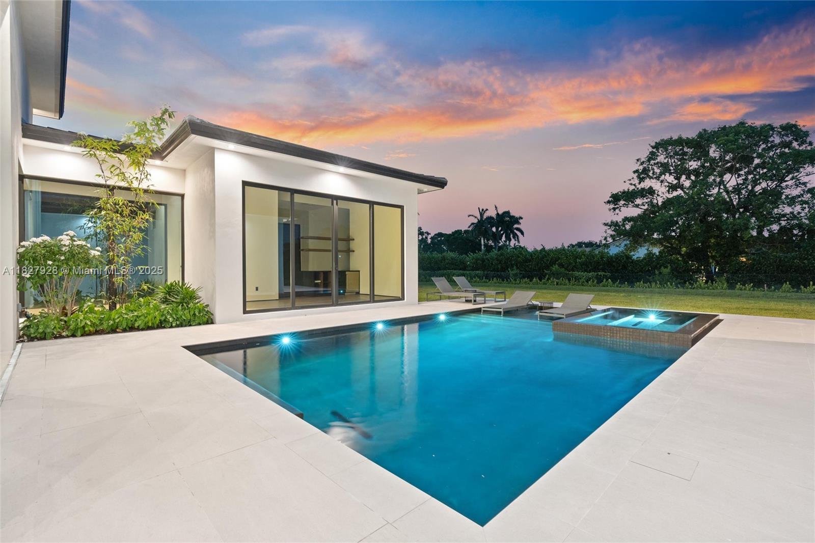 1520 Southwest 149th Terrace Fort Lauderdale, FL 33325 - Photo 75 of 80 a view of a swimming pool with an outdoor space and seating area