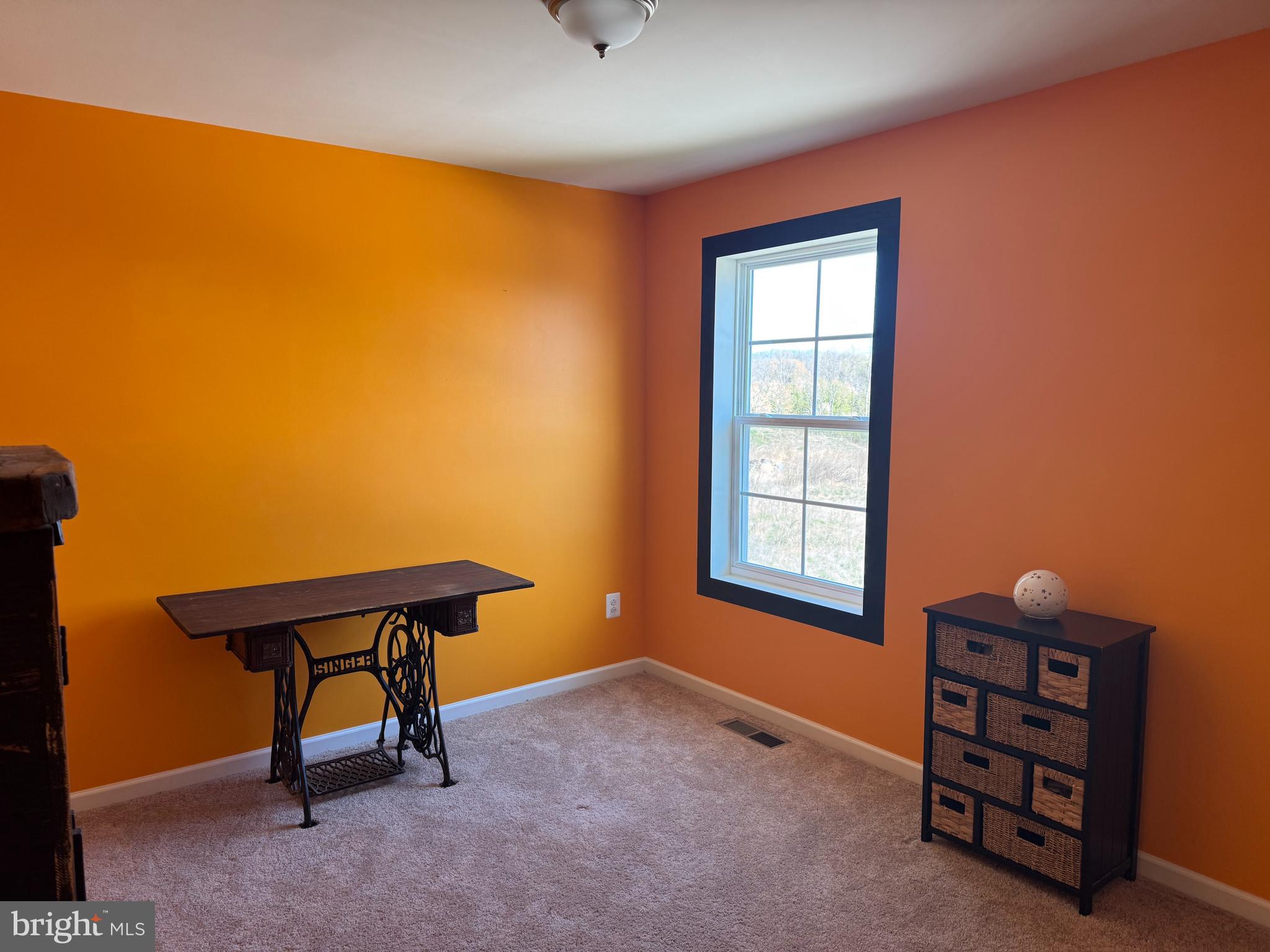 96 Chesterfield Road East Berlin, PA 17316 - Photo 29 of 52 a room with a chair and a window