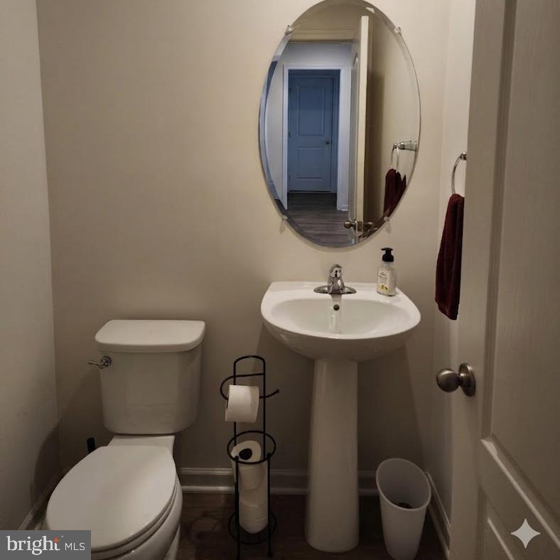 96 Chesterfield Road East Berlin, PA 17316 - Photo 39 of 52 a white toilet sitting next to a bathroom sink