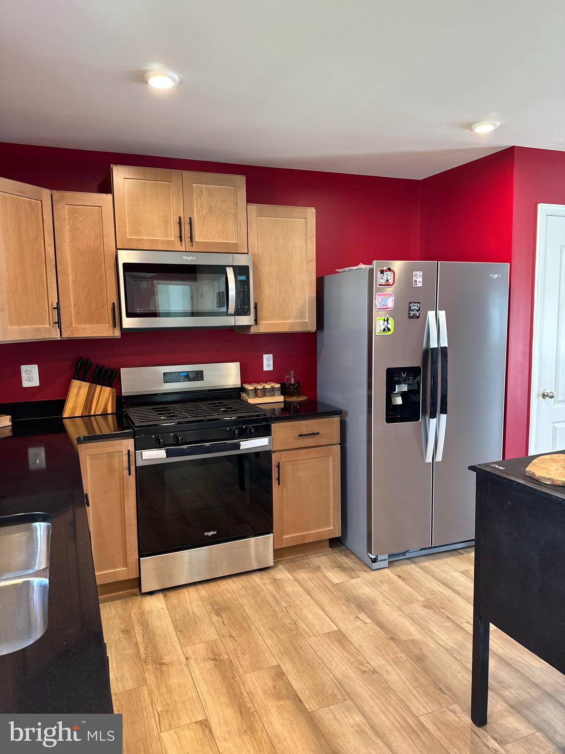 96 Chesterfield Road East Berlin, PA 17316 - Photo 5 of 52 a kitchen with stainless steel appliances kitchen island granite countertop a refrigerator and a stove top oven