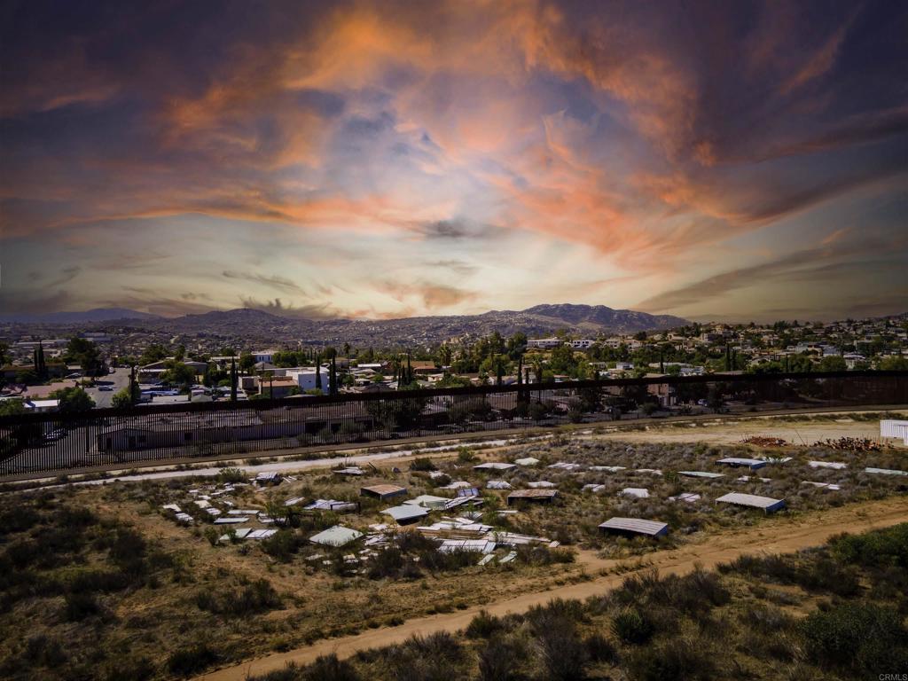 100 Mission Tecate Road Tecate, CA 91980 - Photo 3 of 29 a view of a lake with mountains in the background