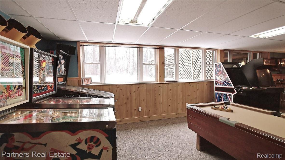 5371 Dutton Road Gregory, MI 48137 - Photo 45 of 72 Wonderful partially finished basement features oversized daylights to optimize light and the view.