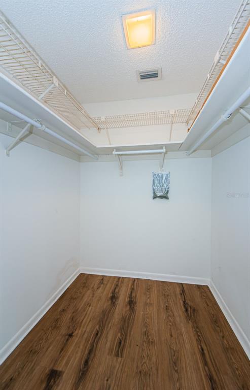 2650 Countryside Boulevard, Unit F110 Clearwater, FL 33761 - Photo 14 of 26 a view of a room with wooden floor