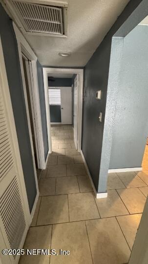 1052 Maynard Street, Unit 1054 Jacksonville, FL 32208 - Photo 5 of 8 a view of a hallway