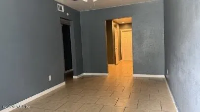 a view of an empty room with a gallery