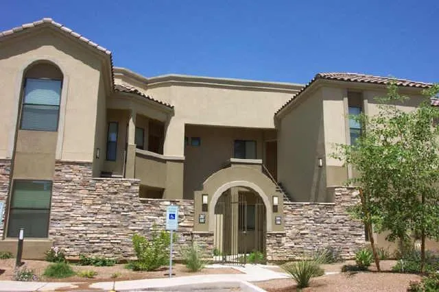 a front view of a house with parking