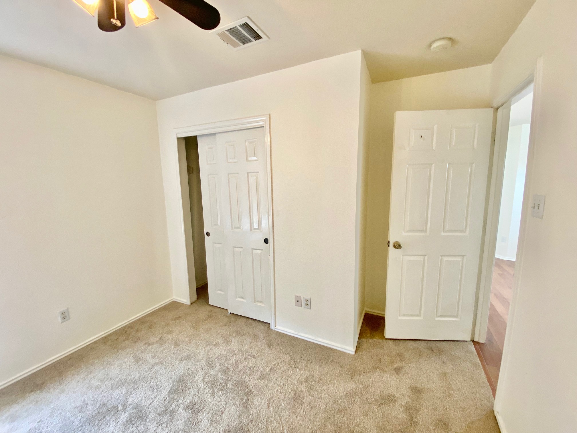 1000 Berry Bend Path Round Rock, TX 78664 - Photo 12 of 20 Cozy bedroom with plush carpeting and ample natural light, ideal for peaceful retreats.