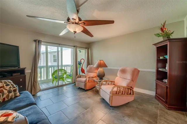 a view of balcony with furniture