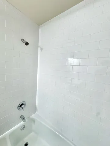 a bathroom with a bathtub